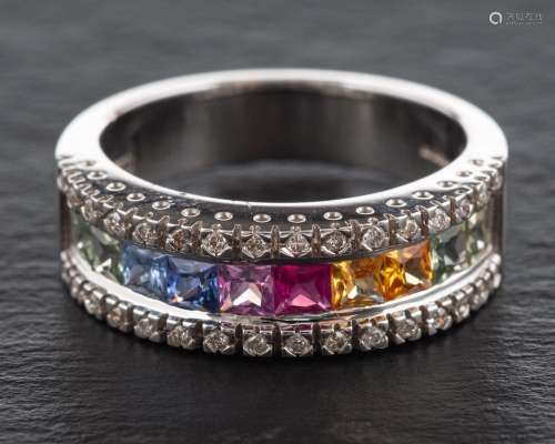 An 18ct white gold ring set with vari-coloured, mixed-cut co...