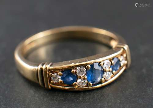 A 9ct gold, sapphire and round, brilliant-cut diamond ring,:...