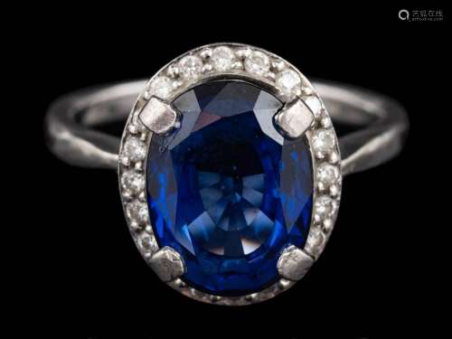 A diffusion treated sapphire and diamond ring,