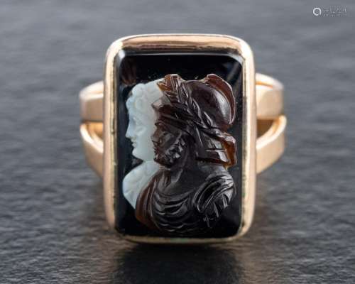 A 15ct gold, 19th century, carved sardonyx cameo ring,: depi...