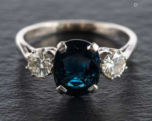 An oval mixed-cut sapphire and round, brilliant-cut diamond,...