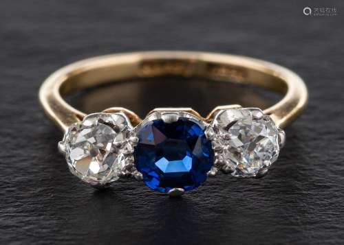 A cushion-cut synthetic sapphire and old-cut diamond three s...