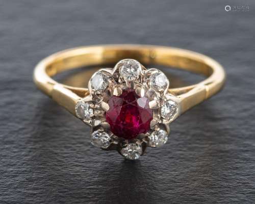 An 18ct gold, ruby and round, brilliant-cut diamond cluster ...