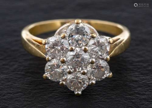 An 18ct gold, round, brilliant-cut diamond cluster ring,: to...