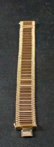 A mid-20th century, fancy-link bracelet,: stamped 750 with I...