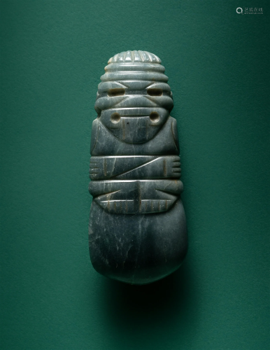 A Costa Rican Jade Axe God Pendant Length 3 inches (7.6 cm).