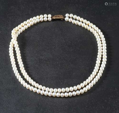 A double row, cultured pearl necklace,: the cultured pearls ...