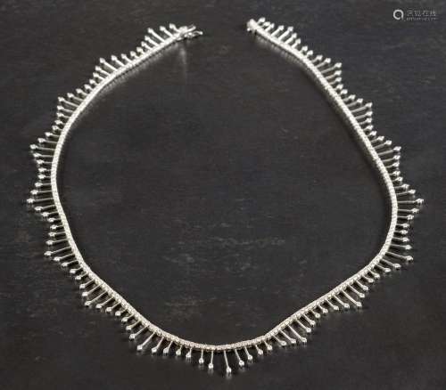 A fringed choker necklace set with round, brilliant-cut diam...