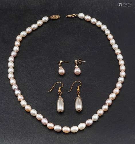 A cultured pearl necklace and pair of earrings,