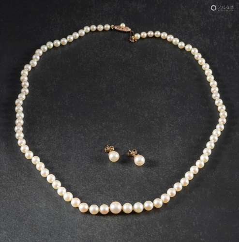 A Mikimoto graduated, cultured pearl necklace and pair of ea...