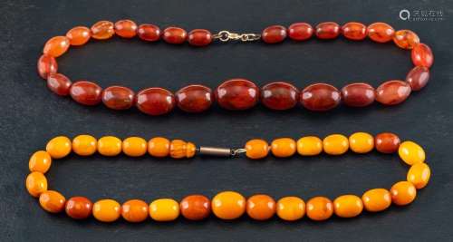 An amber and an amber and amber imitation necklace,: a neckl...
