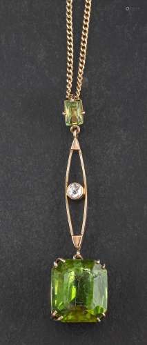 A peridot and old-cut diamond pendant,: calculated weight of...