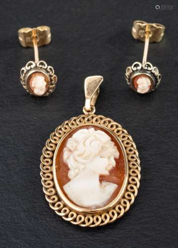 A 9ct gold shell cameo pendant and a pair of associated shel...
