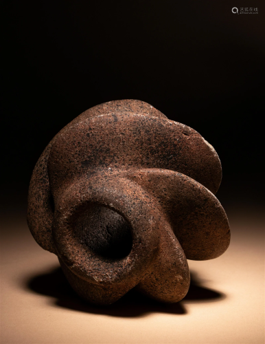 A Chavin Stone Mace Head Height 3 1/2 inches (9 cm).
