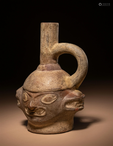 A Moche-Huari Four Headed Vessel Height 6 1/2 inches (16.5 c...