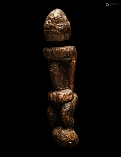 A Dogon Wood Standing Figure Height 6 3/32 inches (15.5 cm).