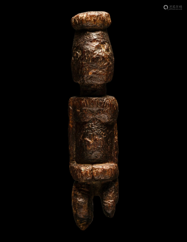 A Dogon Wood Standing Figure Height 5 1/8 inches (13 cm).
