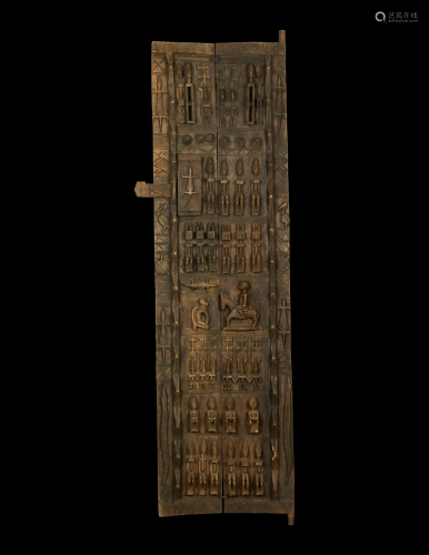 A Dogon Wood Granary Door or Shutter Height 77 inches (195.6...