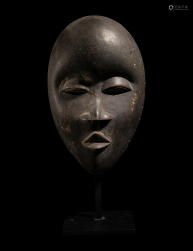 A Dan Wood Mask Height 9 5/16 inches (23.6 cm).