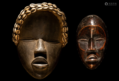 Two Dan Wood Masks Height of largest 12 inches (30 cm).