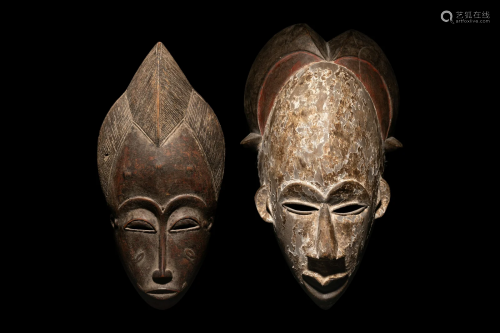 Two Baule Wood Masks (Mblo) Height of largest 12 5/16 inches...