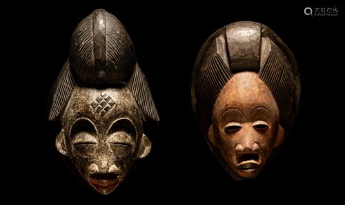 Two Punu Wood Masks Height of largest 13 13/32 inches (34 cm...