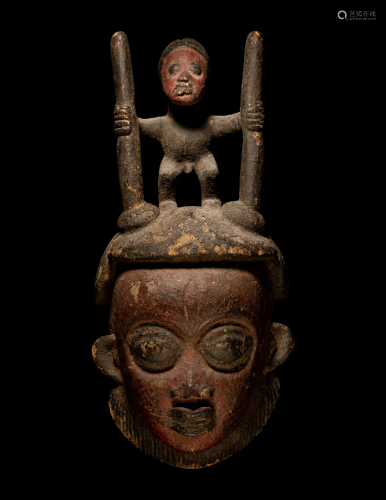 A Punu Wood Mask Height 20 9/16 inches (52.4 cm).