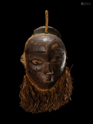 A Pende Wood Miniature Mask Height 6 inches (15 cm).
