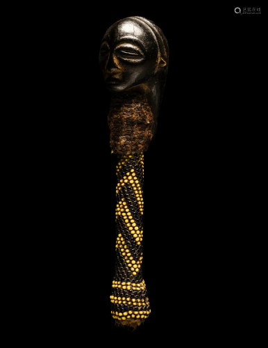 A Kalange Beaded Handle Height 6 9/16 inches (16.7 cm).