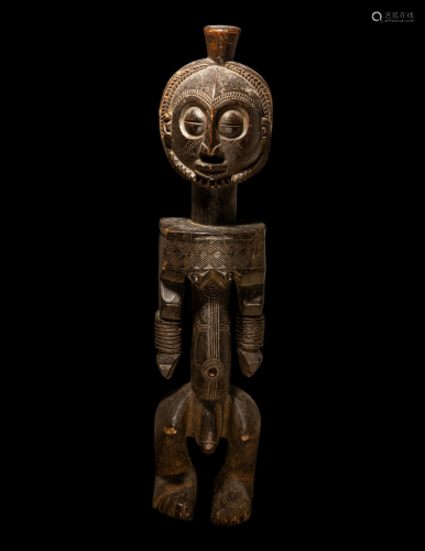 A Central African Wood Male Figure Height 29 3/16 inches (74...