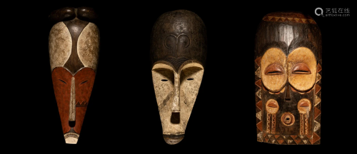 Three African Style Painted Wood Masks Height of largest 36 ...