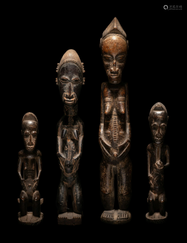 Four African Wood Figures Height of largest 21 19/32 inches ...