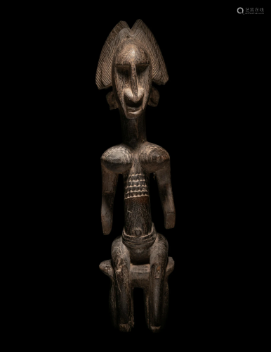 An African Wood Figure Height 19 1/2 inches (49.5 cm).