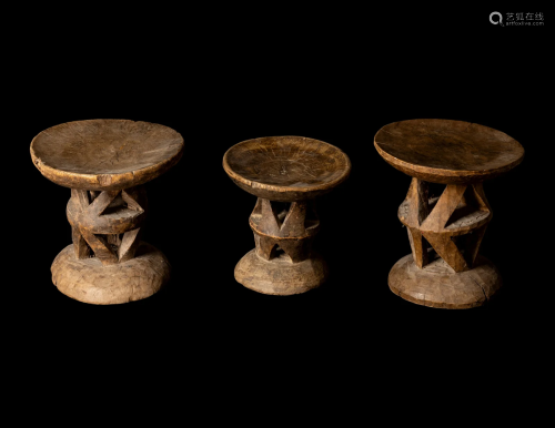Three Tonga Wood Stools Height of largest 11 1/4 inches (28....
