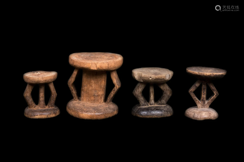 Four Tonga Wood Stools Height of largest 13 inches (33 cm).