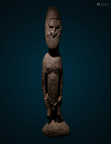 A Kanganamon Wood Standing Figure Height 56 1/4 cm (143 cm).