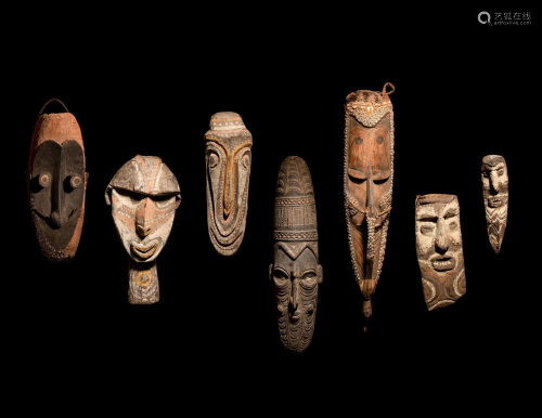 Seven Oceanic Wood Masks Height of largest 25 3/16 inches (6...