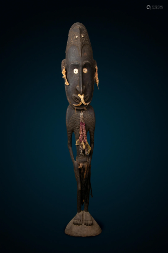 A Kanganamon Standing Figure Height 71 1/8 inches (180.7 cm)...