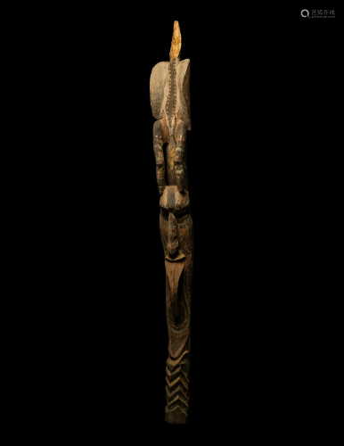 An Oceanic Wood Figure Height 47 11/16 inches (121.2 cm).