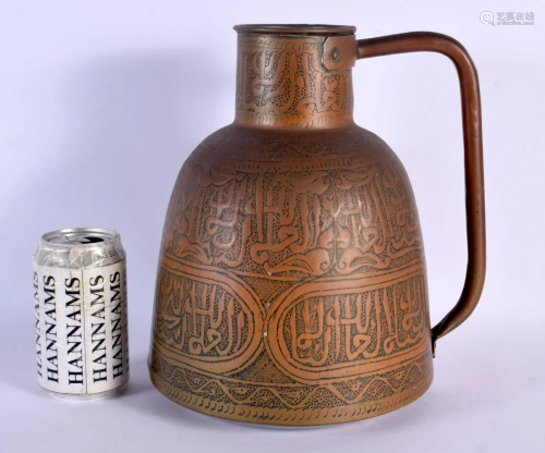 A LARGE 19TH CENTURY MIDDLE EASTERN KUFIC ISLAMIC COPPER JUG...