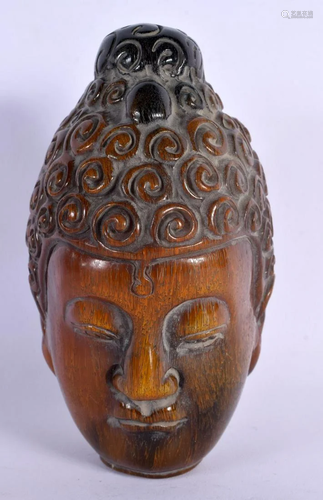 A CHINESE CARVED BUFFALO HORN TYPE BUDDHA HEAD 20th Century....