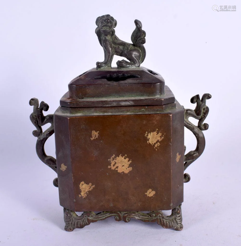 A CHINESE TWIN HANDLED BRONZE CENSER AND COVER 20th Century....