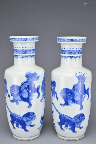 A PAIR OF CHINESE BLUE AND WHITE PORCELAIN ROULEAU FORM VASE...