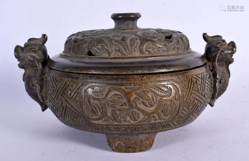 A CHINESE TWIN HANDLED BRONZE CENSER AND COVER 20th Century....