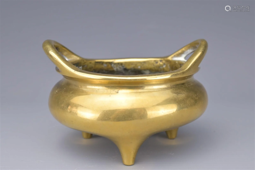 A CHINESE POLISHED BRONZE TRIPOD CENSER