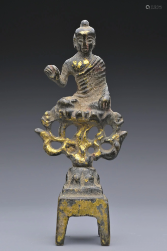 AN EARLY CHINESE GILT-BRONZE FIGURE OF BUDDHA, POSSIBLY WEI ...