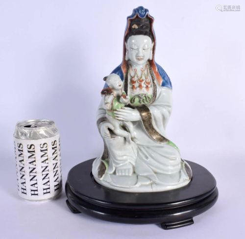 A RARE 18TH CENTURY CHINESE PORCELAIN FIGURE OF A SEATED IMM...