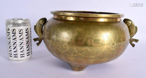 A LARGE 19TH CENTURY CHINESE ENGRAVED BRONZE CENSER with fis...