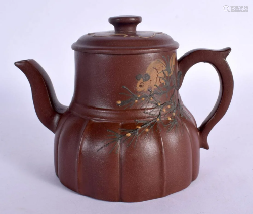 A CHINESE YIXING POTTERY TEAPOT AND COVER 20th Century. 16 c...