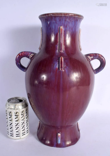 A LARGE CHINESE TWIN HANDLED FLAMBE GLAZED VASE 20th Century...